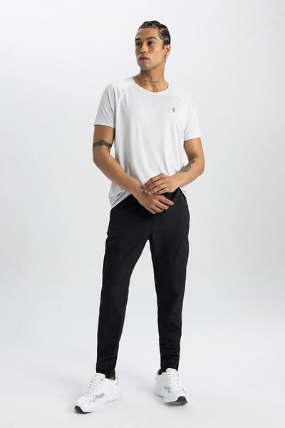 DeFacto Fit Sportsman Jogger Tepláky Slim Fit Úzký střih Tkané nohavice se třemi kapsami na zip B2780ax24sm