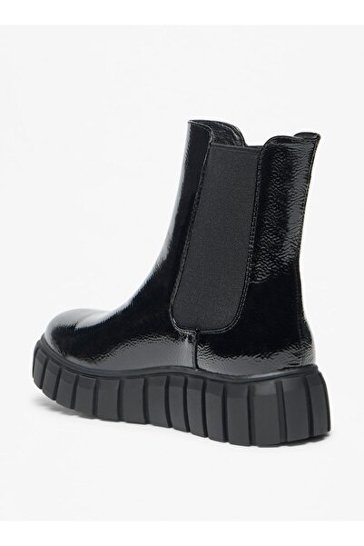 Celeste Women's Solid Slip-On Flatform Boots