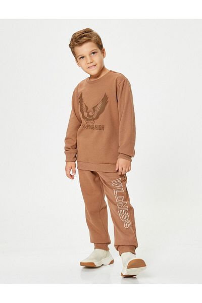 Koton Pantaloni de sport Jogger, cu imprimeu tematic, cu buzunare, cravată în talie