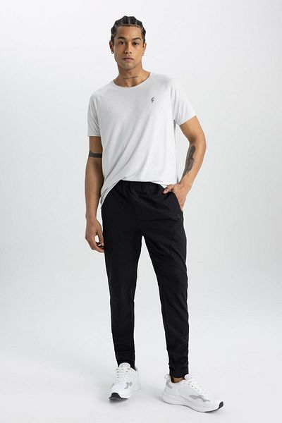 DeFacto Fit Sportsman Jogger Tepláky Slim Fit Úzký střih Tkané nohavice se třemi kapsami na zip B2780ax24sm