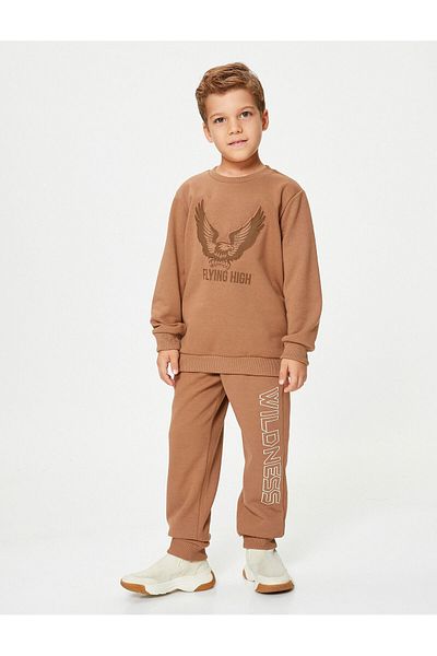 Koton Pantaloni de sport Jogger, cu imprimeu tematic, cu buzunare, cravată în talie