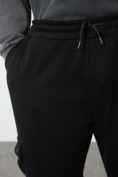 Trendyol Collection Plus Size Black Oversize/Wide Cut Thick Rubber Leg Sweatpants with Cargo Pockets Tmnaw25Aj00002