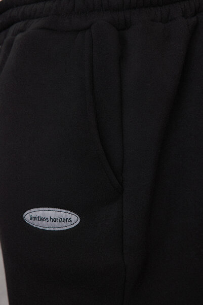 Trendyol Collection Plus Size Black Oversize/Wide Cut Pocketed Label Loose Sweatpants Tmnaw25Aj00001
