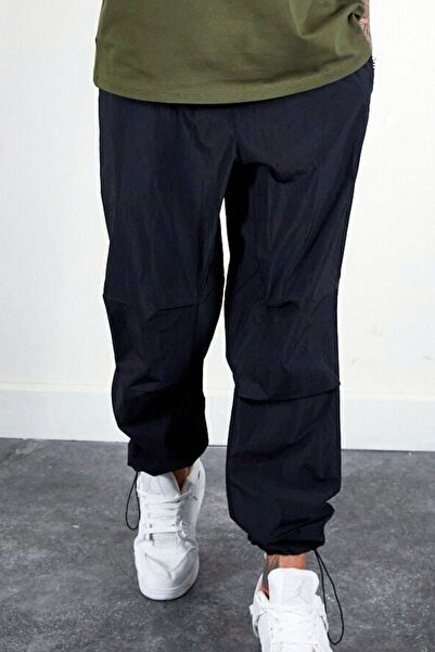 MissKybele Normal Bel Beli ve Paçası Lastikli ve İp Bağlama Büzgülü Cepli Dizi Dikişli Rahat Paraşüt Pantolon