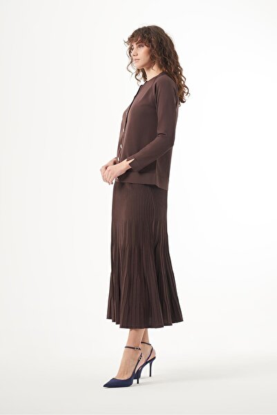 Nuss Mercerized Suit with Pleated Skirt and Raglan Sleeve