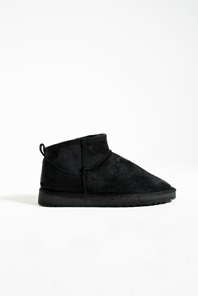 star shoes حذاء طويل جدًا للكاحل مصنوع من الجلد السويدي الأسود مع نعل داخلي مسطح من الفراء للنساء