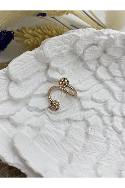 Arescollection Surgical steel rosegold spiral spiral piercing with stones at both ends
