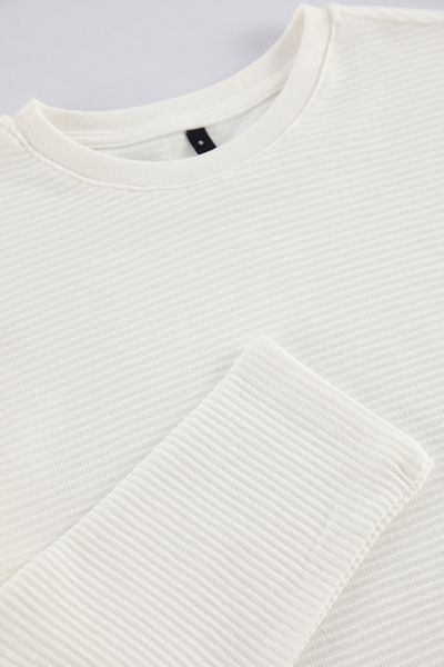 Trendyol Collection Základní bavlněné tričko Ecru s dlouhým rukávem – 100% textura, Regular Fit Tmnaw25Ts00002