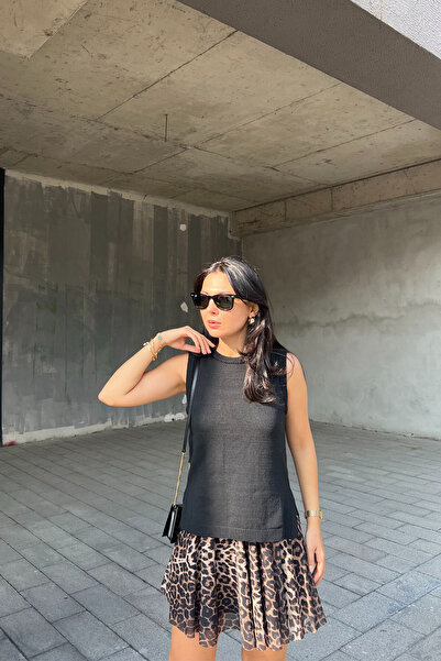 Seda Yalçın Atelier Чорна трикотажна блуза - з розрізом