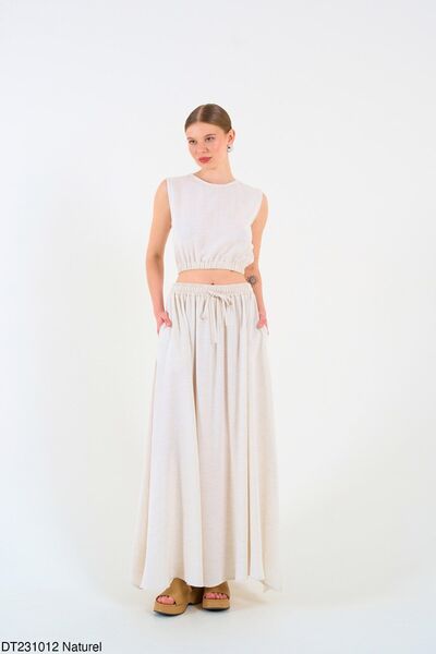 Liora تنورة قصيرة من الكتان الطبيعي ومجموعة مطاطية بفتحة رقبة دائرية