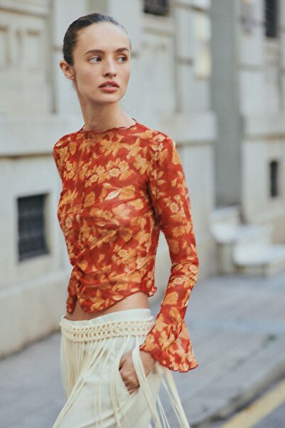 Pilea Bluză Ross din plasă cu imprimeu floral, cu mâneci spaniole, cu detaliu...