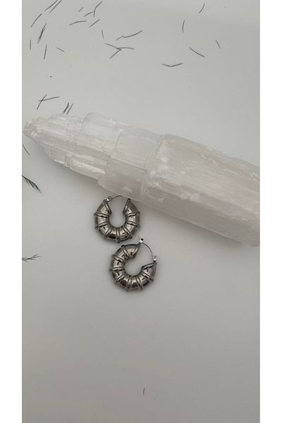 Doğaltaş Masalları Steel hoop earrings
