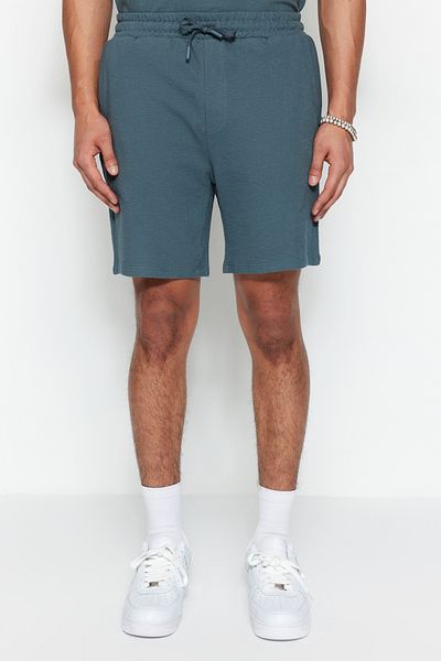 Trendyol Collection Premium Petrol - 100% bavlněné šortky s texturou TMNSS23SR00035