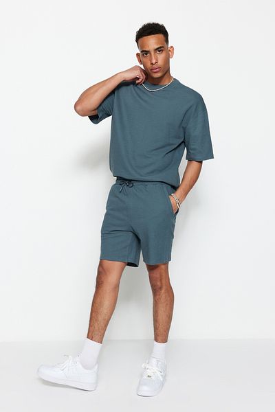 Trendyol Collection Premium Petrol - 100% bavlněné šortky s texturou TMNSS23SR00035