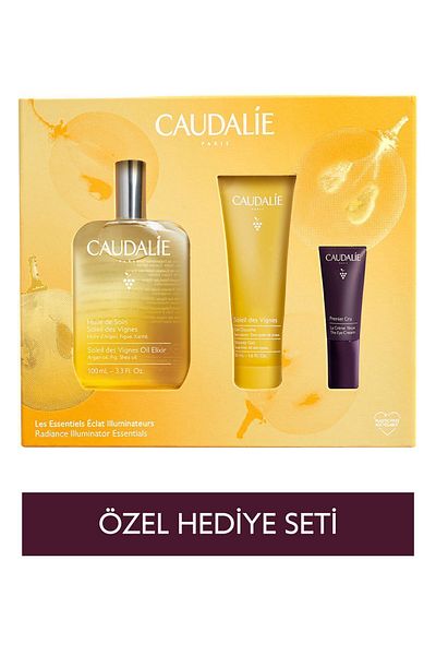 Caudalie مجموعة العناية بالجسم المضيئة بزيت إليكسير وجل الاستحمام - كريم العين 5 مل