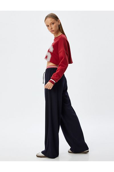 Koton Comfortable Crepe Fabric Wide Leg Trousers with High Waist and Stripe Detail