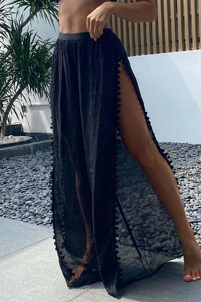 Angelsin Strandhose - Pareo mit Pompom und Schlitzdetail