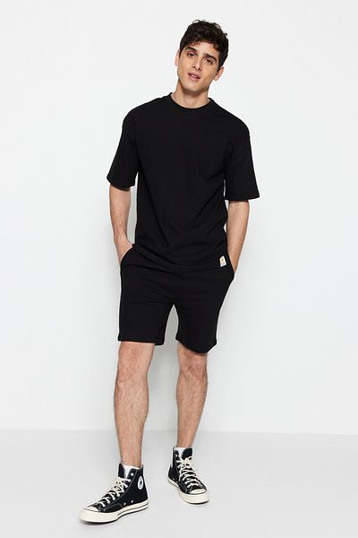 Trendyol Collection Prémiové černé šortky Regular Fit ze 100% bavlny s texturou - TMNSS23SR00035