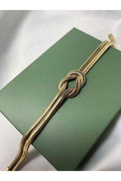 QUATTRO ACCESSORİO سوار بعقدة مسطحة إيطالية - ستيل ذهبي