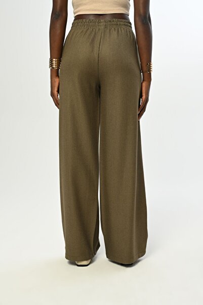 Orfeo Negro KADIN BELİ LASTİKLİ BOL PAÇA SİMLİ DÜZ RENK PANTOLON