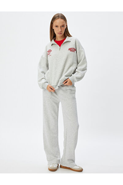 Koton سويت شيرت كبير الحجم - نصف سحاب، طباعة على الظهر وتفاصيل الجيب