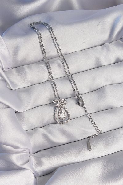 Store 316L الصلب الفضة اللون القوس مفصلة الزركون حجر قطرة نموذج قلادة