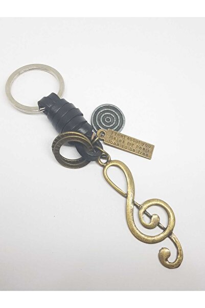 TUNA TAKI & AKSESUAR حلقة مفاتيح على اليسارجلد حقيقيموسيقى، موسيقي