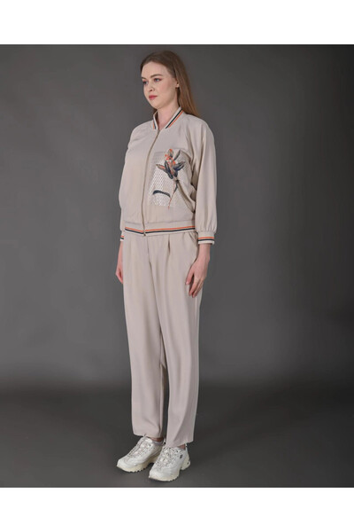 MODATALİKA طقم مكون من قطعتين من سترة رياضية مضلعة ملونة للسيدات من Modatalik...