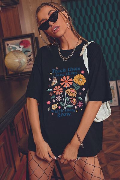uyguntarz Übergroßes Unisex-T-Shirt mit Blumen-Print