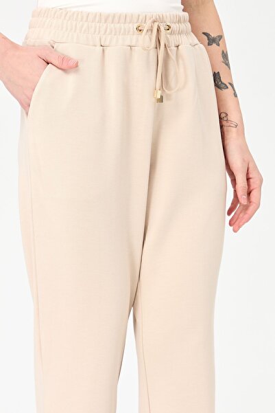 Desen Triko Kadın Paça Arkası Lastikli Cepli Eşofman Pantolon Bej