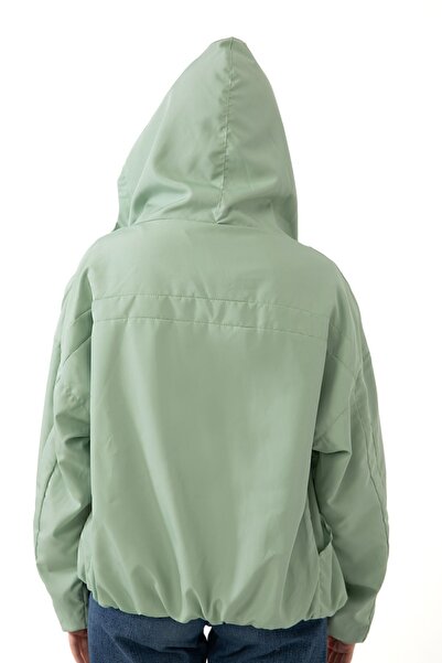 Firststops Γυναικείο αδιάβροχο με κουκούλα Water Green που προσφέρει κομψότητα και άνεση αντιανεμικό εποχιακό αδιάβροχο