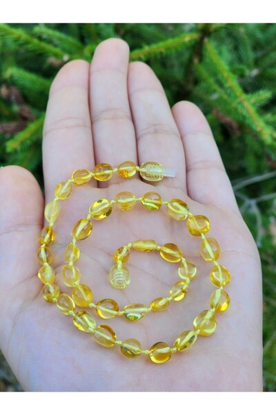 Kehribar Sarayı قلادة على شكل قطرة من العنبر باللون الليموني للأطفال مقاس 33 سم