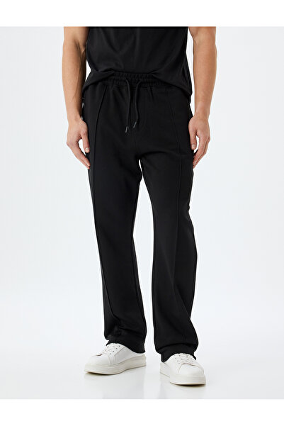 Koton Bavlněné tepláky - krajka v pase, kapsa a detail prošívání