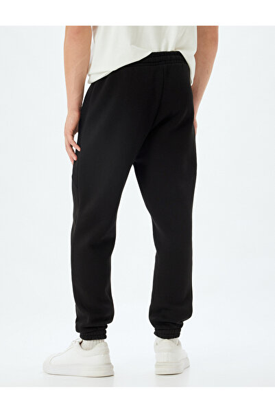 Koton Ελαστική φούτερ από βαμβακερό μείγμα - μέση με κορδόνια, τσέπες και πόδι με ράστερ