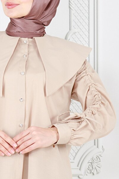 Sevitli Μπεζ χιτώνα - μανίκι με μεγάλο γιακά και λεπτομέρεια με κορδόνι