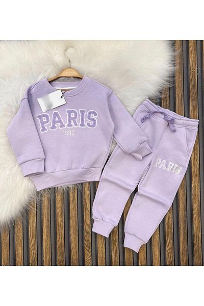 KOKOŞ BEBEK Detaliu costum scris Paris
