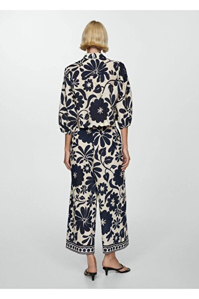MANGO Woman Dökümlü çiçek desenli pantolon