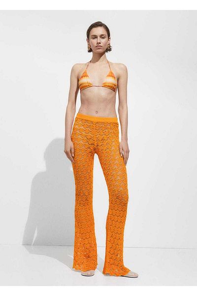 MANGO Woman Pantaloni evazați din croșetat