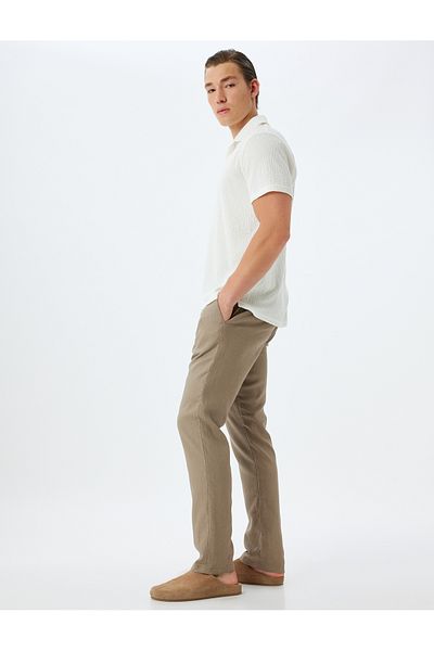 Koton Chino-Leinenhose – Taschendetail und Knöpfe