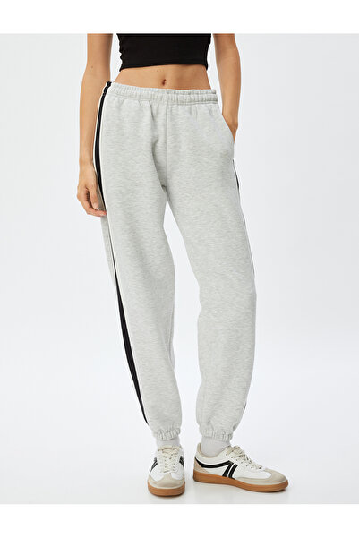 Koton Oversize Jogger Eşofman Altı Beli Bağcıklı Şerit Detaylı Cepli Şardonlu