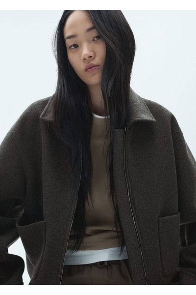 MANGO Woman Κοντό μπουφάν με τσέπες