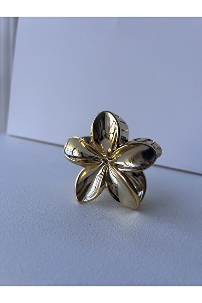 Doğaltaş مشبك لوتس ذهبي اللون