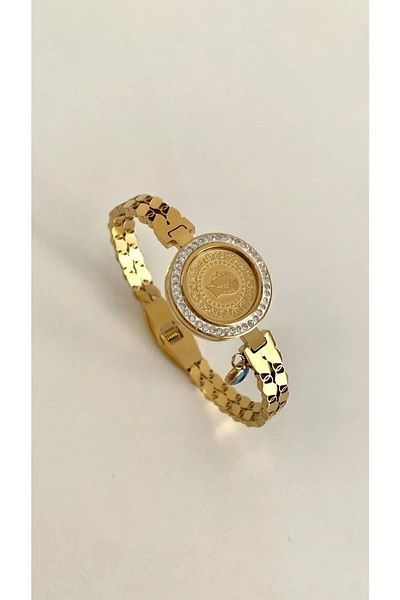 Opia JEWELRY - سوار من الفولاذ باللون الذهبي مزين بسلسلة من القيثارة المتدلية بخرز عين الشر Opj1010