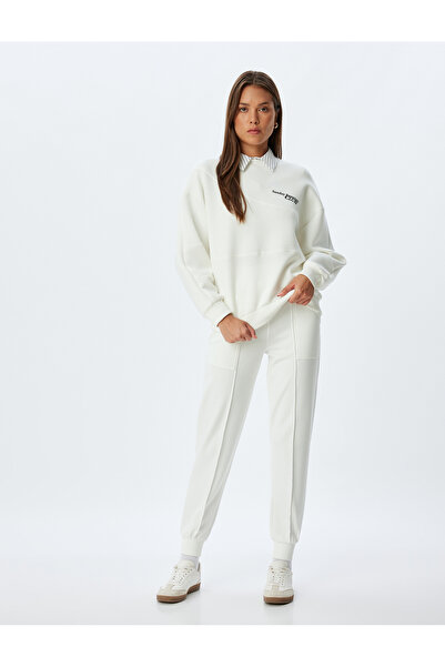 Koton Übergroßes Sweatshirt mit Rundhalsausschnitt und langen Ärmeln aus Scuba-Stoff