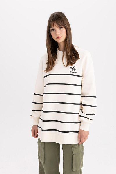 DeFacto Bedruckte weiche, pelzige Sweatshirt-Tunika mit Rundhalsausschnitt - C5417ax24sp