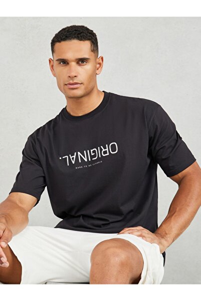 Styli تي شيرت قطني كبير الحجم بطبعة نصية مقلوبة أصلية