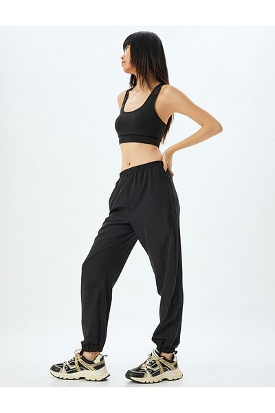 Koton Jogger-Fallschirm-Jogginghose mit hoher Taille, elastische Taille, lockere Passform, Taschendetail