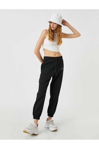 Koton Pantaloni de sport Jogger - picior cu buzunar brodat și talie elastică