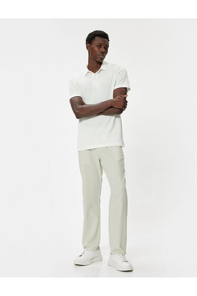 Koton Chino-Leinenhose – Taschendetail und Knöpfe