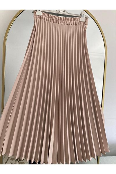 Melike Tatar تنورة مطوي